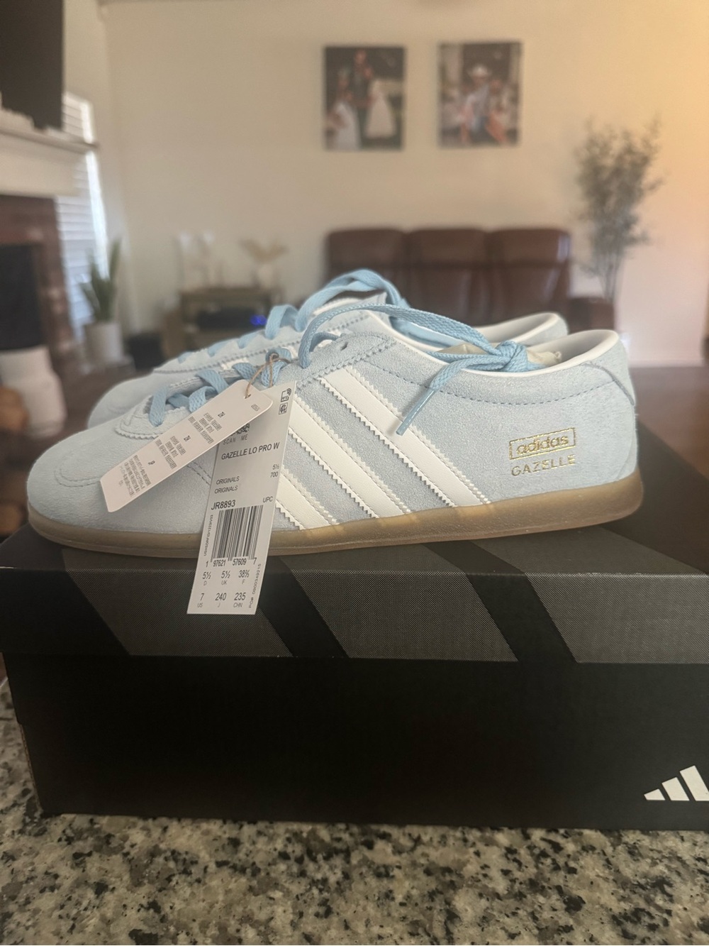 adidas women’sGazelle Pastel Blue Suede Sneakers with White Stripes